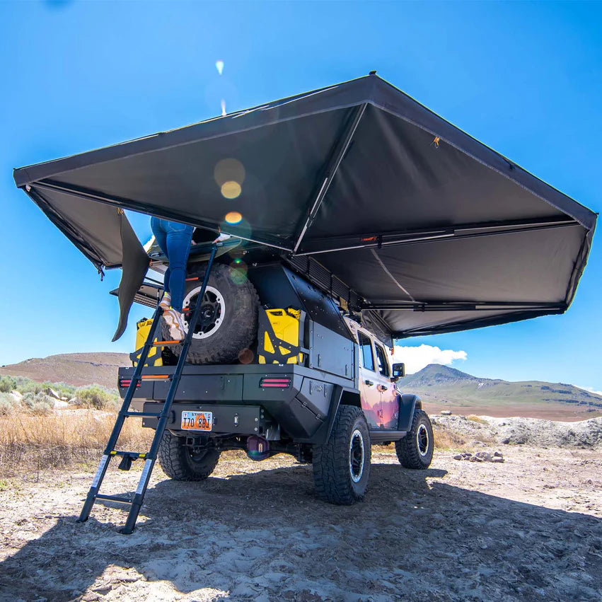 23Zero 270 awning with a ladder mounted on a jeep