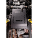 A black metal undercarriage cover with the text 'JUGGERNAUT USA OFFROAD OUTFITTERS' mounted over a vehicle's transmission and differential area, shown in a detailed undercarriage view.
