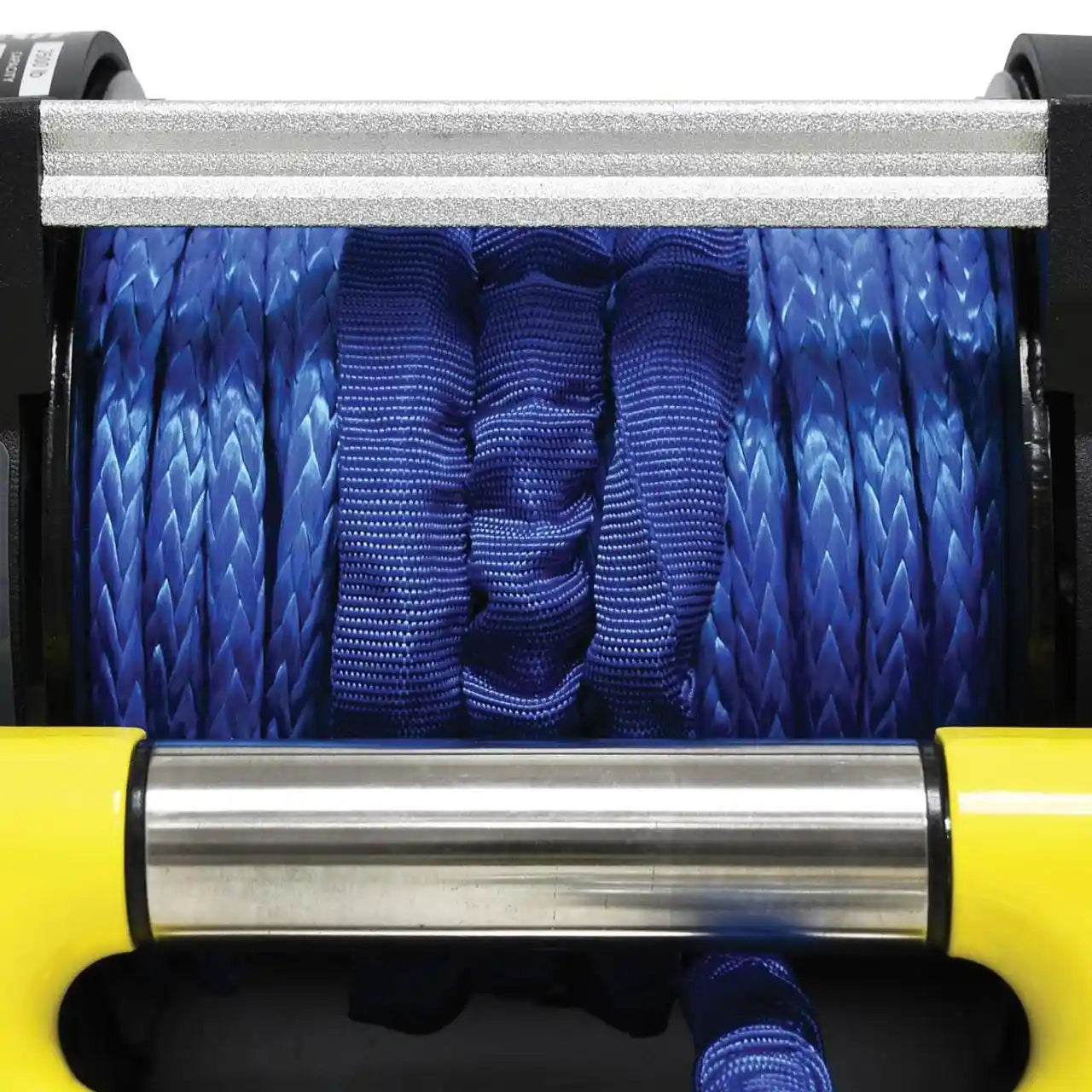 Close-up of a winch with synthetic blue cable and yellow and black casing.