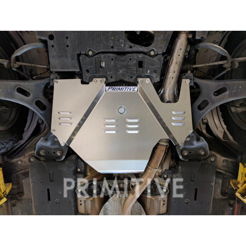 mounted Primitive transmission skid plate on Forester