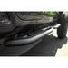 Close-up of a vehicle's side step bar on a truck