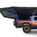 Off-road vehicle with a black awning and LED lights on a white background