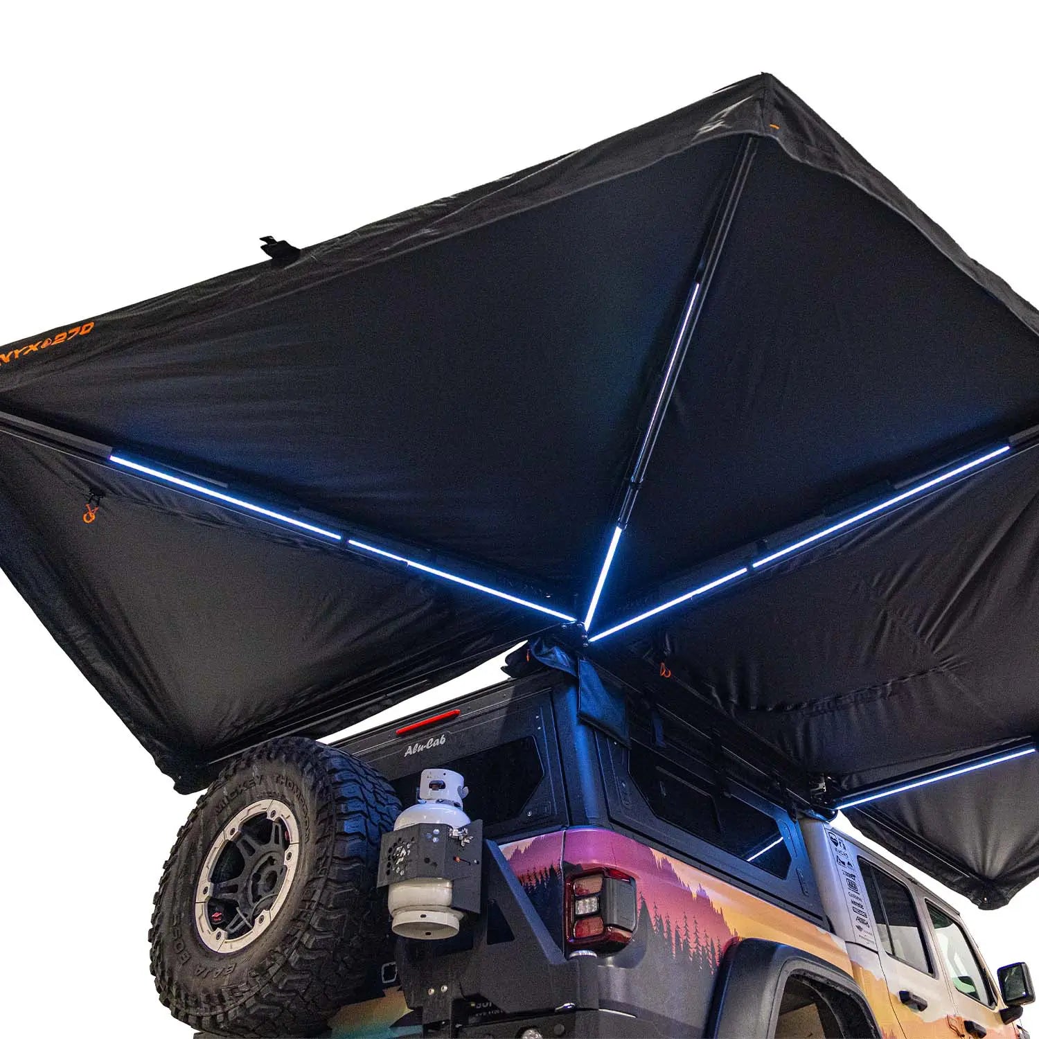 23Zero Onyx awning on a vehicle with LED lights on a white background