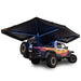 Black 270 awning tent attached to a vehicle with a colorful design on a white background