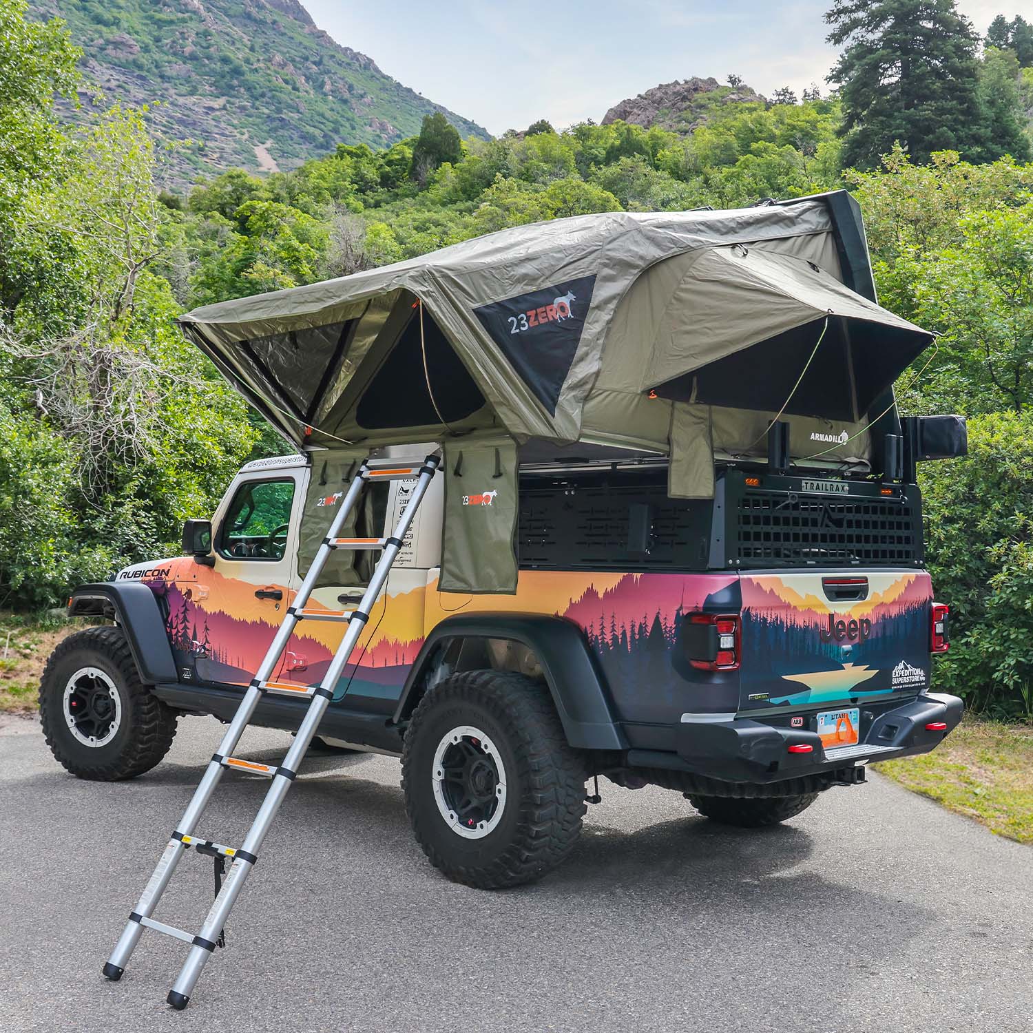 23Zero Armadillo Hardshell RTT on jeep with stairs in mountains