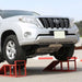 Silver Toyota SUV on a small ramp with installed front skid plate