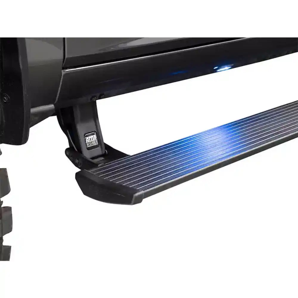 AMP PowerStep extended on a lifted black Ford F-150