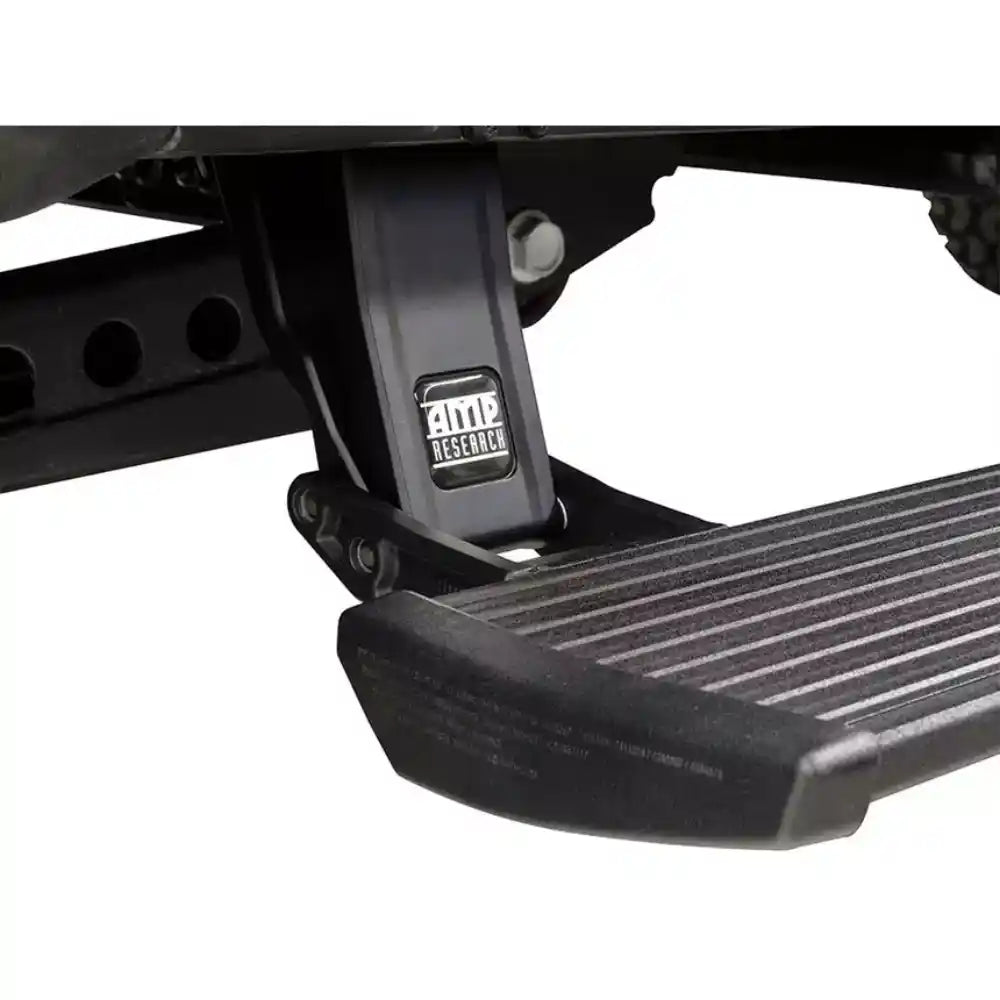 AMP PowerStep retractable truck step with AMP Research logo