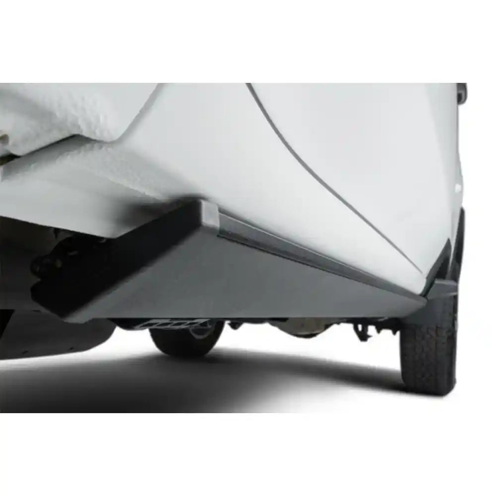 AMP Research PowerStep retractable running board deployed under white Chevrolet Colorado truck