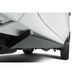 AMP Research PowerStep retractable running board deployed under white Chevrolet Colorado truck