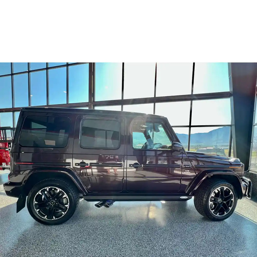 Angled shot of heavy-duty black step slider bracket on G-Class