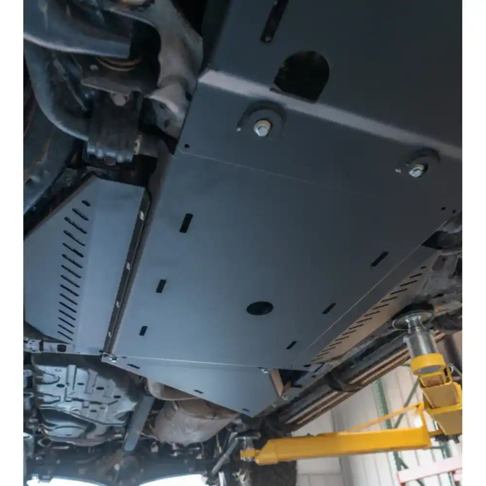 Angled view of installed skid plate from front-left