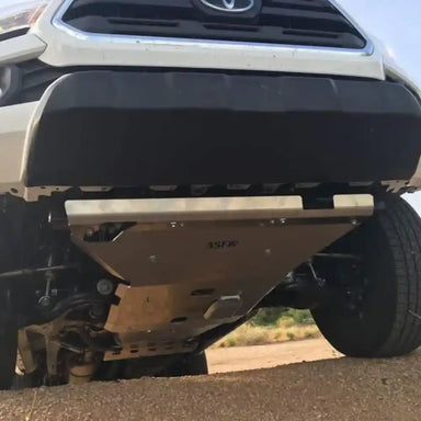 Asfir 4x4 heavy-duty front skid plate installed protecting engine on Toyota Tacoma