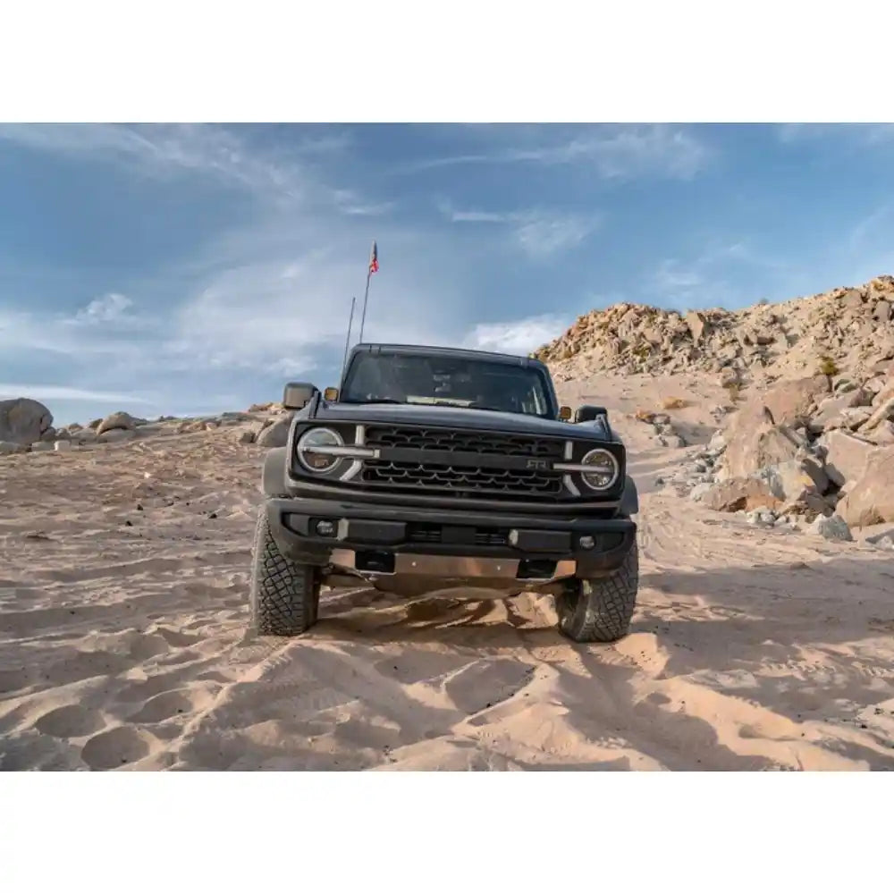 Asfir 4x4 skid plate on Ford Bronco driving rugged off-road trail