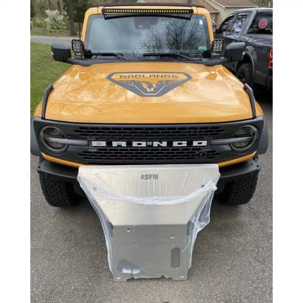 Asfir 4x4 skid plate protecting Ford Bronco during off-road trail driving