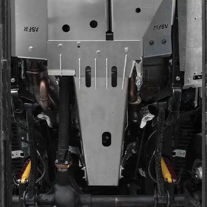 Close-up of Asfir transfer case skid plateAsfir silver front differential skid plate installed on Jeep Wrangler underside