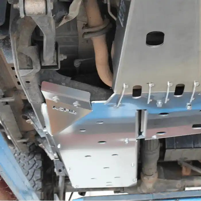 Rear fuel tank skid plate installedAsfir silver transfer case skid plate installed on Jeep Wrangler JK underside