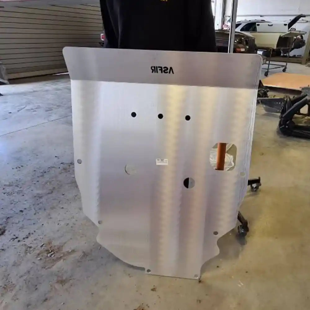 Asfir skid plate standing upright before installation