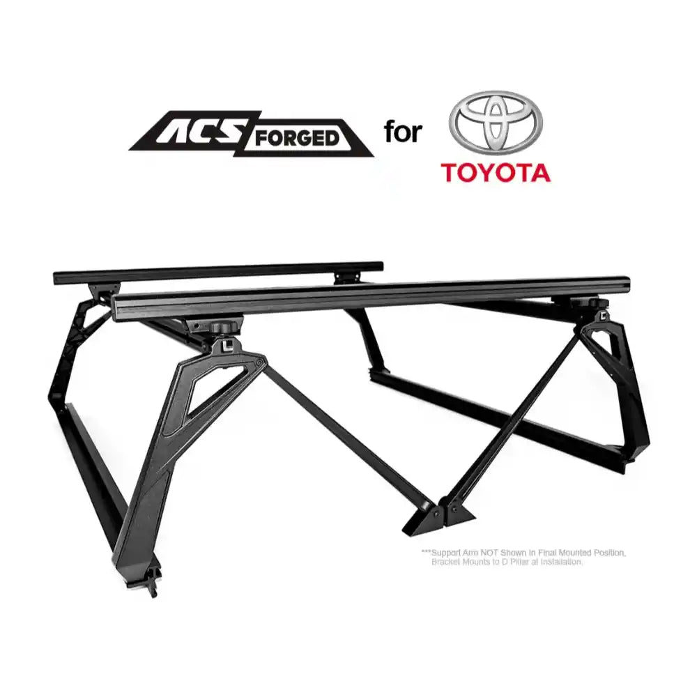 Black metal bed rack with ACS Forged and Toyota logos on a white background