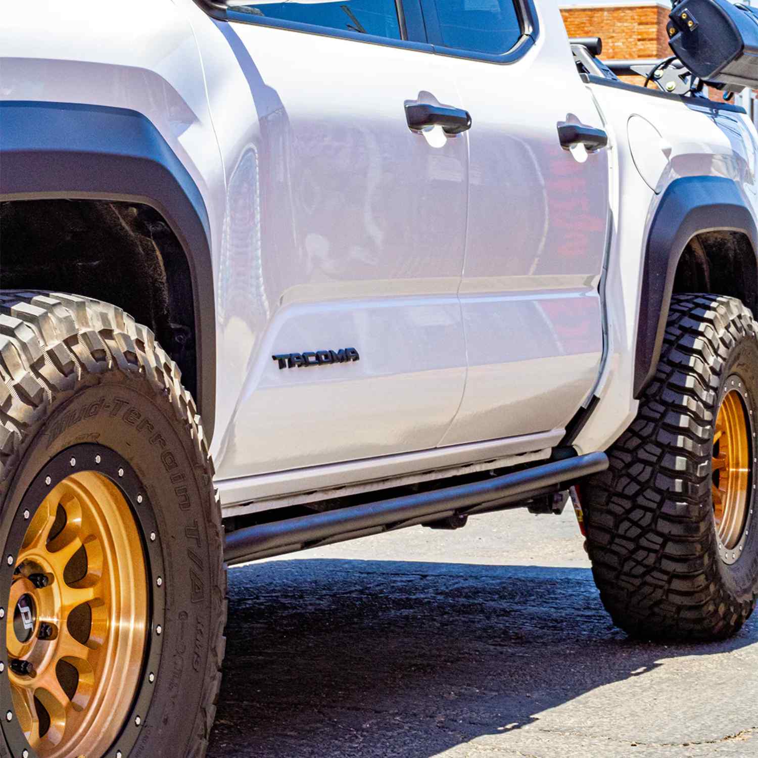 Cali Raised LED Trail Edition Rock Sliders For 2024+ Toyota Tacoma Side View