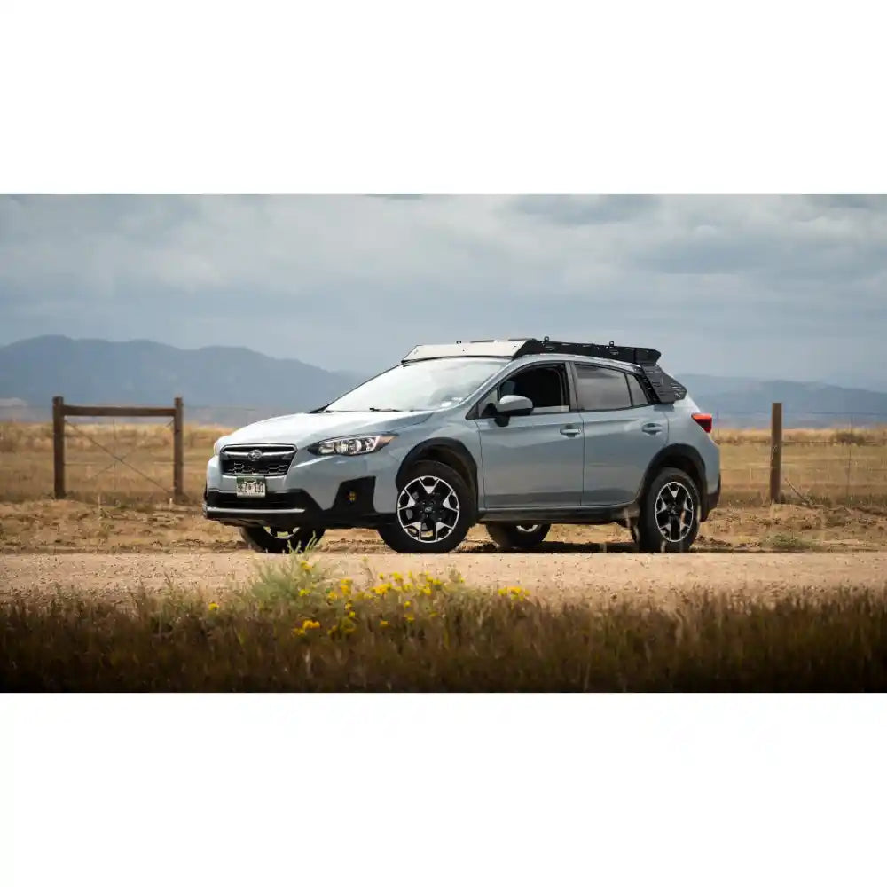Cascade roof rack on Subaru Crosstrek driving on open road