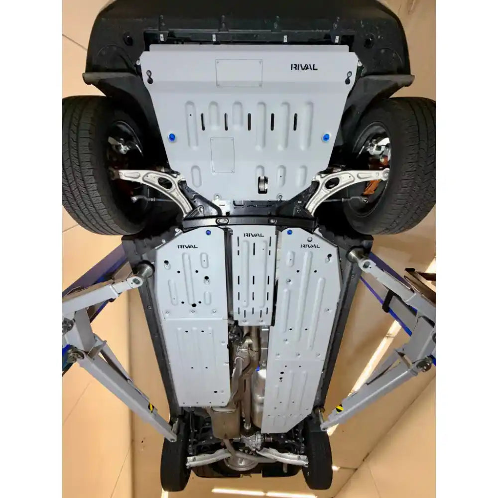 Central tunnel area aluminum skid plates