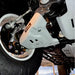 Close-up: RIVAL white skid protecting lower control arm near wheel