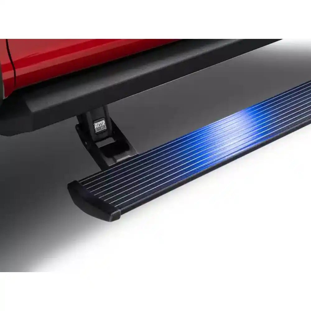 Close-up of AMP Research PowerStep XL with illuminated blue LED lighting on a 2025 Ram 1500