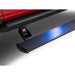 Close-up of AMP Research PowerStep XL with illuminated blue LED lighting on a 2025 Ram 1500