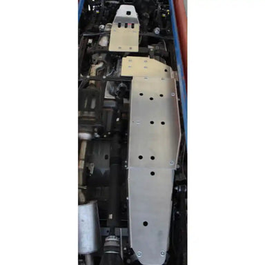 Close-up of Asfir transfer case skid plate (aluminum) installed on Jeep Gladiator JT, showing ventilation holes and drain access.