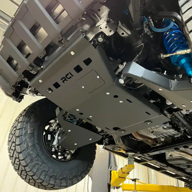 Close-up of RCI engine skid bolted to Tacoma front crossmember