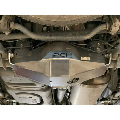 Close-up of RCI rear diff skid plate showing drain access hole