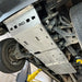 Close-up of RCI transmission and mid-section skid plates on lifted Colorado