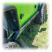 Close-up of Turn Offroad rock sliders on green Jeep JK doo
