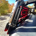 Close-up of a overland rack with 'Rock Side' branding on a vehicle, set against a natural background.