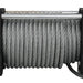 Close-up of a winch with coiled steel cable on a white background