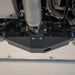 Close-up of black powder-coated differential skid plate protecting the rear diff