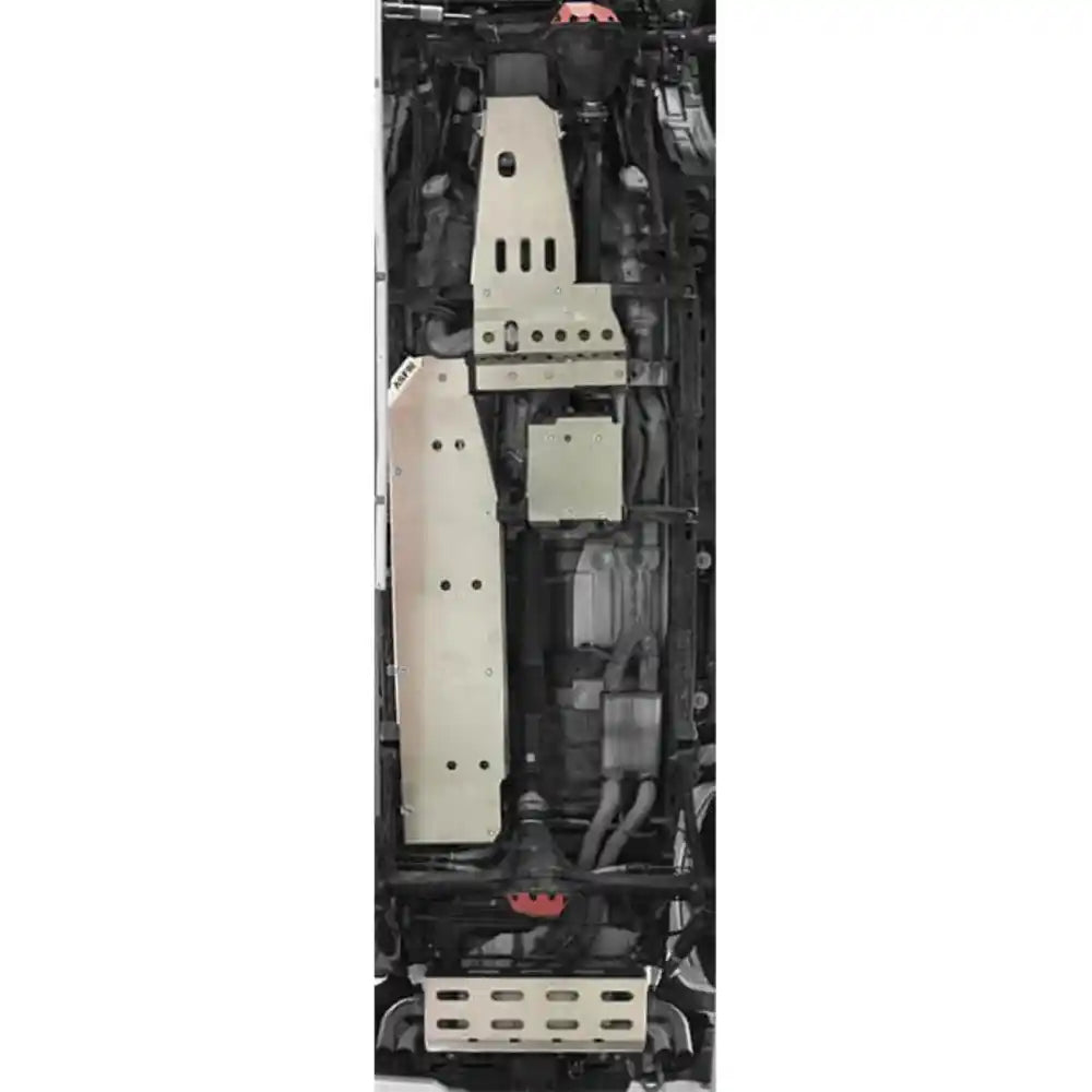 Detailed view of Asfir skid plates on the underbody.Close-up of installed Asfir transmission skid plate.