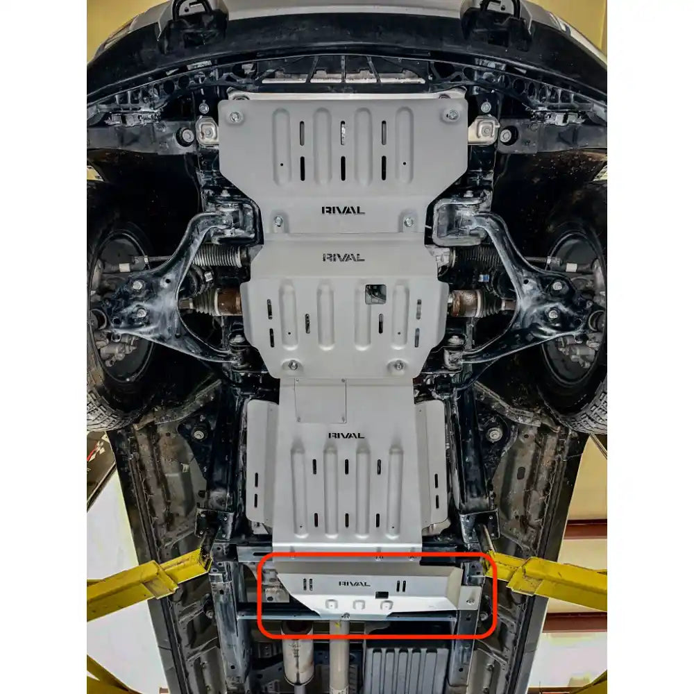 Close-up of mounted RIVAL transfer case skid plate with hardware