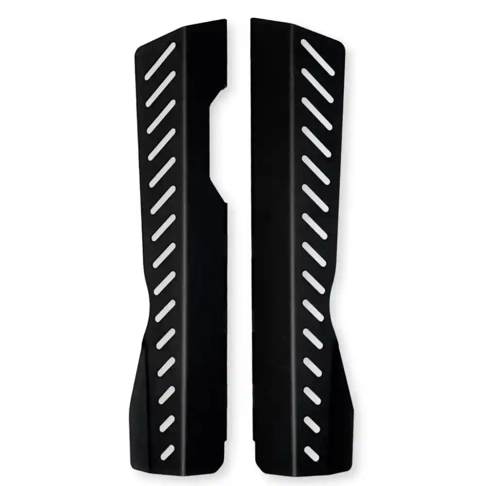 Close-up of ribbed or slotted black protective shield sections for catalytic converter