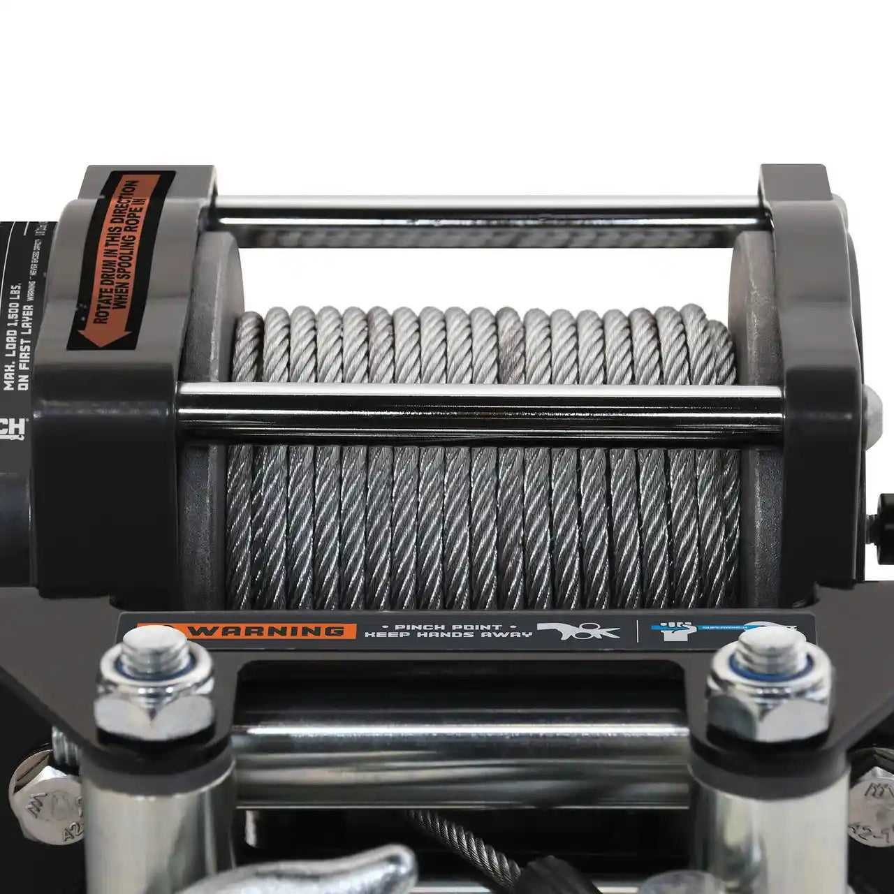 Close-up of a winch with coiled steel cable on a white background