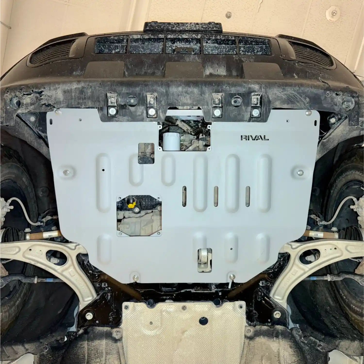 Close up view of mounted engine skid plate for Ford