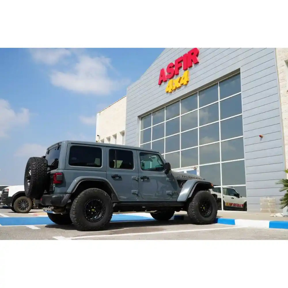 Complete Asfir 6-piece skid plate kit installed under a Jeep Wrangler JL.
