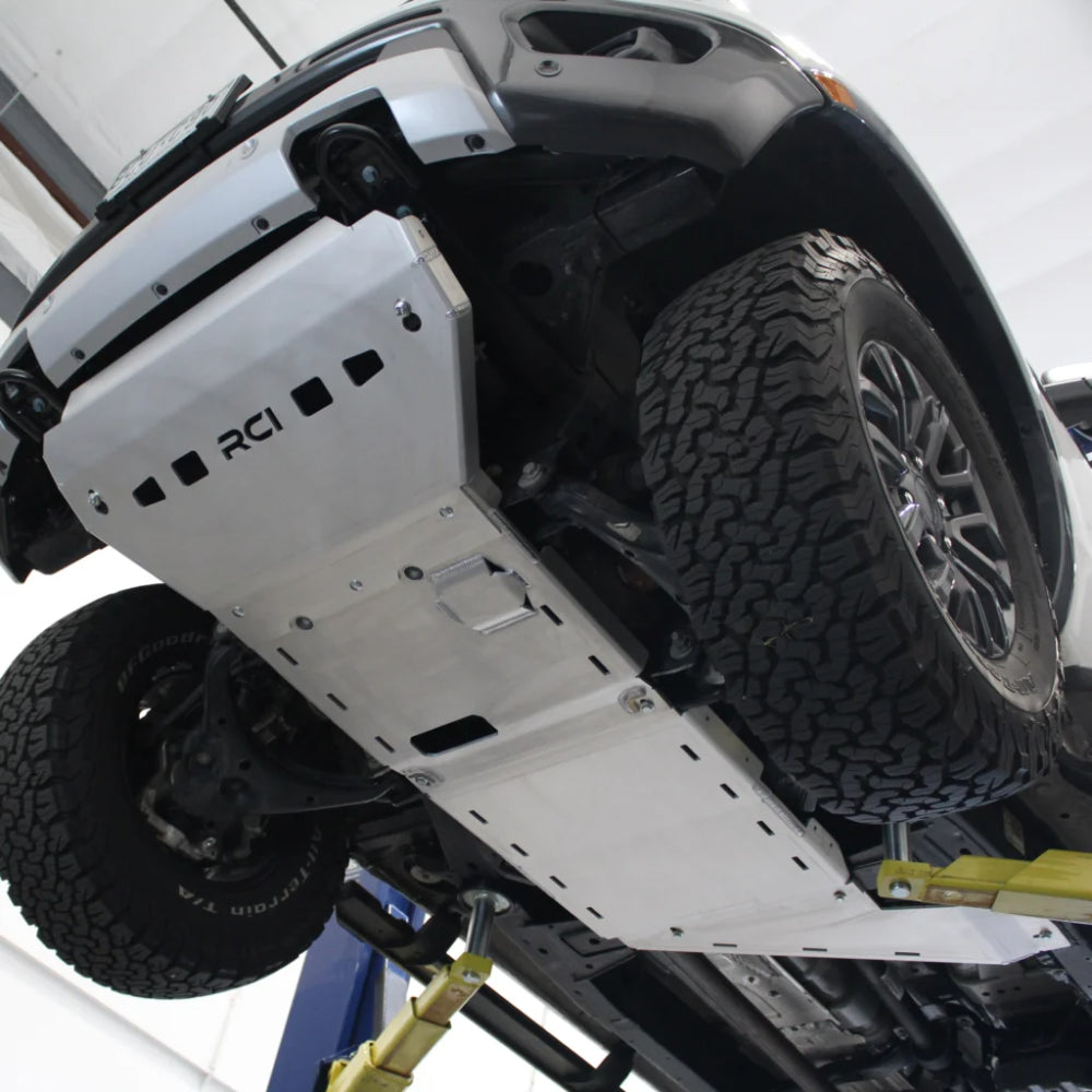 Complete RCI black skid plates on jacked-up Ranger.