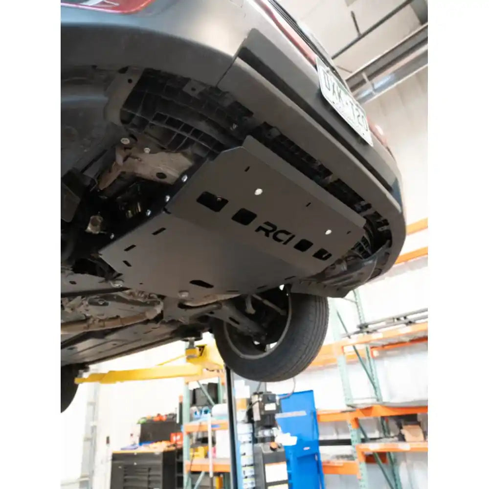 Complete RCI skid under Forester on hoist