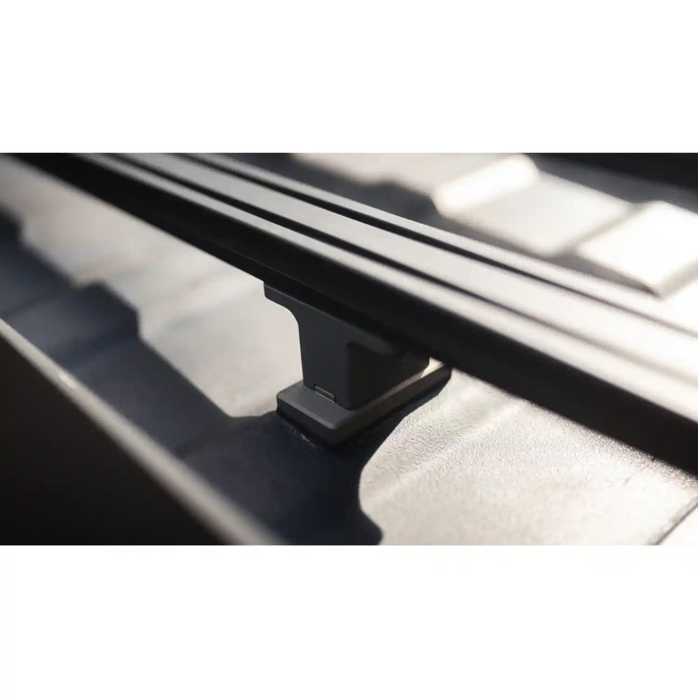 Close-up of a black car roof rack on a vehicle
