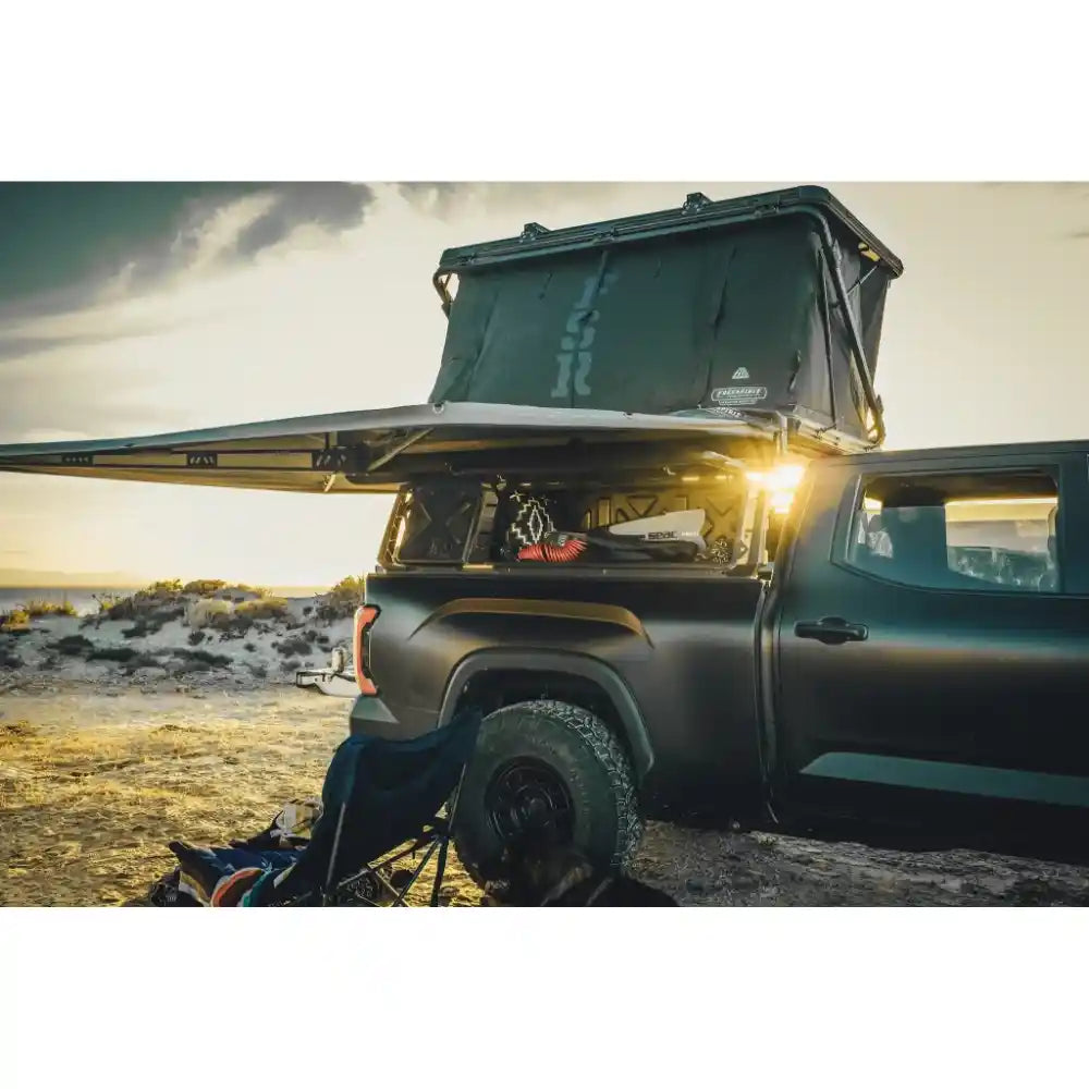 Roof top tent on Leitner Designs ACS FORGED Bed Rack on Toyota