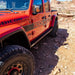 Deployed folding step on Rock Slide slider under Gladiator door