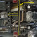 Detailed underside view of Jeep Gladiator JT engine bay area with Asfir engine/transmission skid plate and crossmember protection installed, marked with yellow measurement lines.