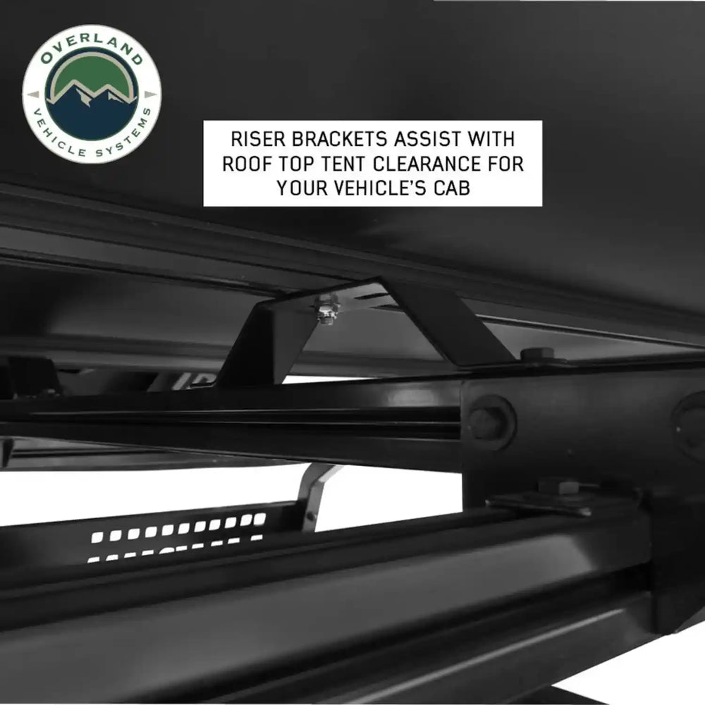 Riser brackets for roof top tent clearance with Overland Vehicle Systems logo.